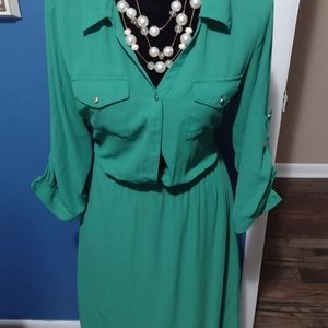 Green dress with silver buttons